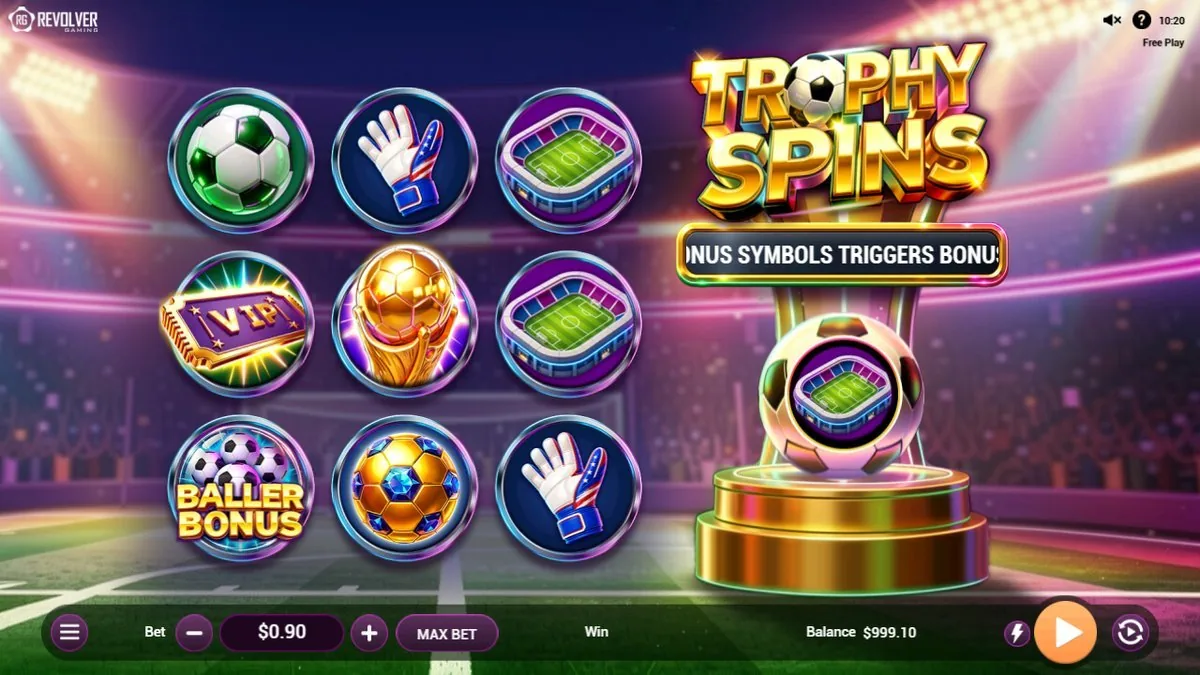 The base board in Free Play: match balls, goalkeeper gloves, a stadium tile, a VIP ticket and a Baller Bonus scatter, with the golden trophy meter on the right and a BONUS SYMBOLS TRIGGERS BONUS banner. Bet $0.90, balance $999.10.